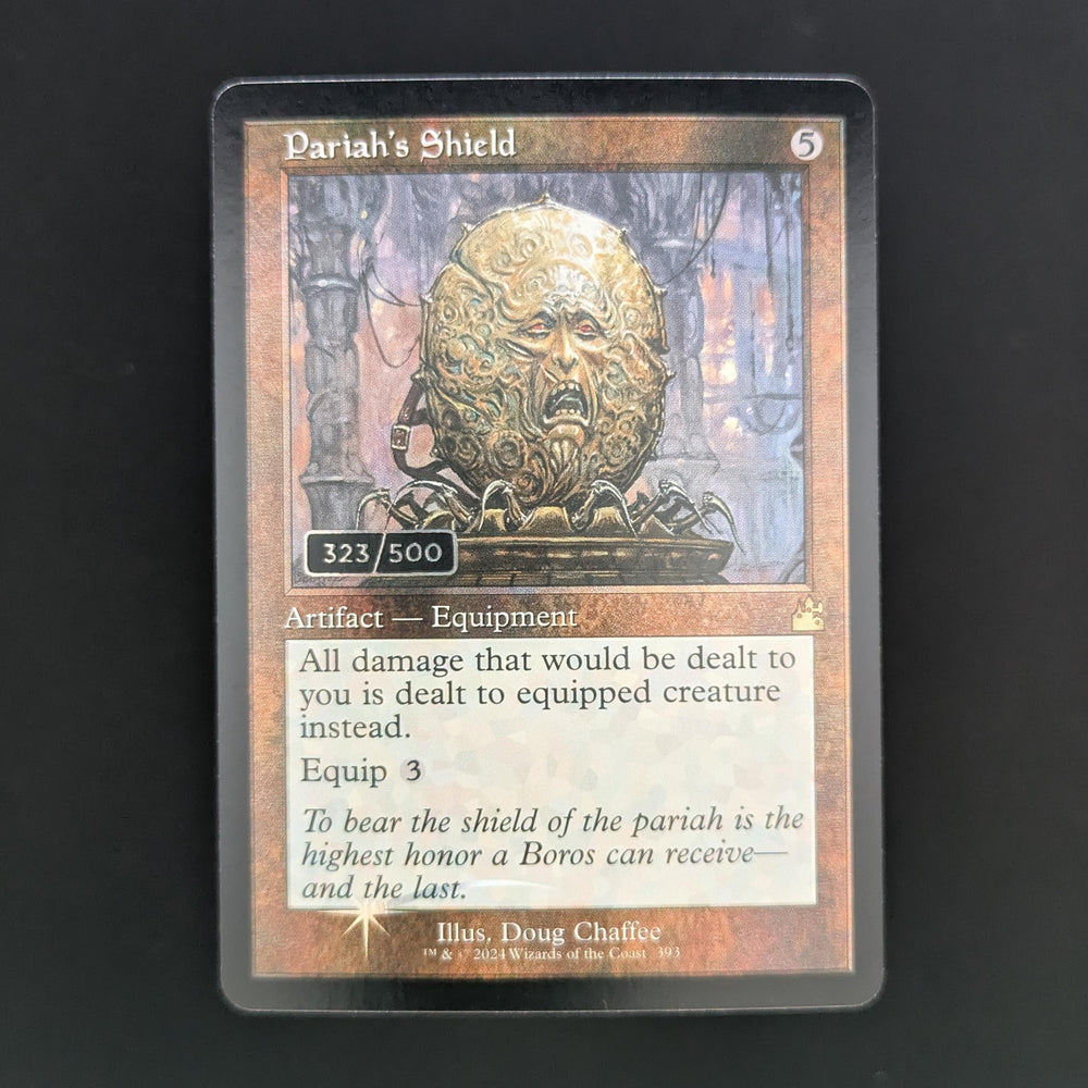 [FOIL] Pariah's Shield (Retro Frame) (Serial Numbered) - Ravnica Remastered: Extras - English - NM - 323/500